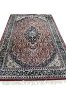 A North West Persian blue ground carpet, 276 x 181cm