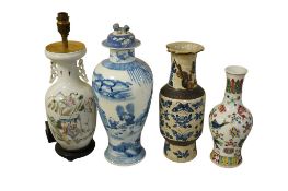 Three Chinese vases to include a blue and white example with cover, together with a famille rose