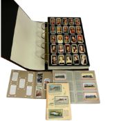 An extensive collection of cigarette cards arranged in an album to include kings and queens of