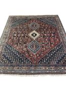 A Hamadan red, blue and ivory rug, 230 x 200cm
