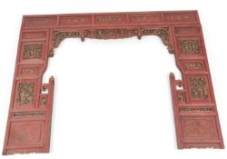 A Chinese lacquered and carved wood wedding screen, 196cm wide, 156cm high