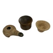 A Roman terracotta oil lamp, a terra cotta vessel and a Victorian treen cylindrical box, lamp 11cm