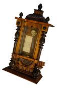 A late 19th century walnut Vienna regulator with pendulum, 90cm in length
