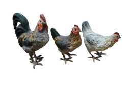 An Austrian cold painted bronze cockerel and two hens, early 20th century, largest 5.5cm high