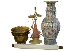 Chinese items comprising a rose quartz lamp, a set of three brass bowls, a large famille rose vase