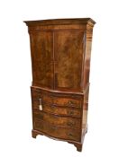 A Queen Anne Revival serpentine walnut cocktail cabinet, width 72cm, depth 48cm, height 152cm