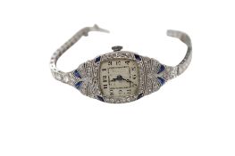 A lady's Art Deco platinum, synthetic sapphire and diamond set manual wind cocktail watch, with