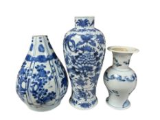 Three 18th and 19th century Chinese blue and white vases to include a yen yen example, one with neck