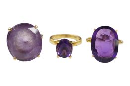 A 750 yellow metal and single stone oval cut amethyst set ring, size N, gross weight 6.1 grams,