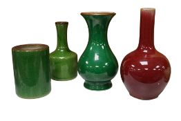 Two Chinese green crackle glazed vases, larger 17cm, a similar brush pot and a sang de boueff