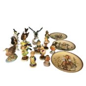 A Collection of Hummel figures of birds and children, together with three plates