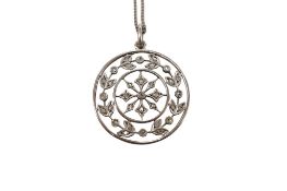 An Edwardian yellow and white metal, rose cut diamond cluster set open work circular pendant,
