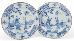 A set of four Chinese blue and white figural plates, each 23cm in diameter