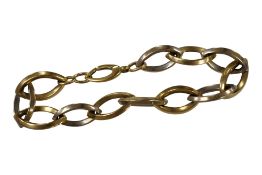 A two colour 750 yellow metal navette shaped link bracelet, approx. 20cm, 18.3 grams.