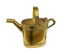 A large Victorian brass watering can, 48cm wide