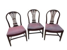 A set of six Hepplewhite style mahogany dining chairs, with wheatsheaf splats, width 54cm, depth