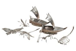 A pair of Japanese Asahi sterling miniature model sail boats, height 69mm, together with four