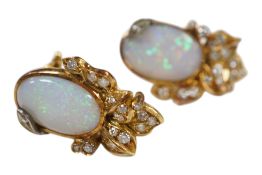 A pair of Italian 750 yellow metal, opal and diamond cluster set ear clips, 22mm, gross weight 9.9