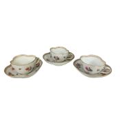Set of three Meissen floral quatre lobed cups and saucers, saucers, 13cm wide