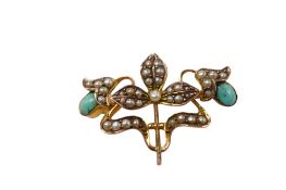 An early 20th century 9ct, seed pearl and turquoise cluster set brooch, width 28mm, gross weight 2.8