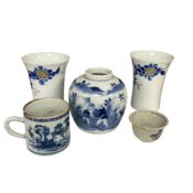 Five pieces of Chinese and Japanese porcelain to include a pair of saki cups a a blue and white jar,