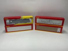 Four boxed Hornby 00 gauge tender locomotives; a BR class 9F (R3756), a BR Britannia class 7MT (