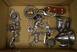 Eight car radiator mascots, etc., including a horse, two Jaguar mascots, an elephant, a bulldog, the