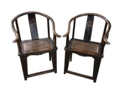A pair of Chinese lacquered elm horseshoe back chairs, Quanyi, Qing dynasty, width 64cm, depth 41cm,