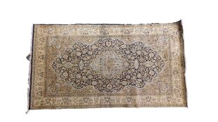 A Quom ivory ground part silk floral medallion rug 266 x 166cm