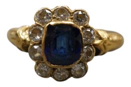A late Victorian yellow metal, sapphire and diamond set rectangular cluster ring, with carved