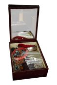 A box of jewels including a gem-set bracelet, the bracelet set with circular-cut amethyst, zircon,
