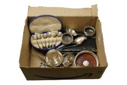 A collection of assorted silver including a modern silver mounted wine coaster, napkin rings,