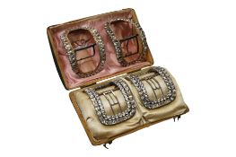 A cased pair of 19th century paste set steel shoe buckles, 73mm and one other similar pair.