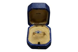 An Art Deco style 9ct & plat, single stone sapphire and two stone diamond chip set ring, size O,