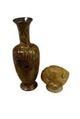 A Doulton Lambeth Leaves pattern vase and a Doulton stoneware Toad rock jar and cover, largest