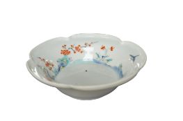 A late 17th century / early 18th Arita Kakiemon petal-shape dish, diameter 13cm.