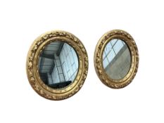 A pair of gilt and composite oval mirrors, width 43cm, height 48cmProvenance - the estate of a