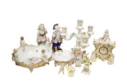 A pair of late 19th century French porcelain figures, height 25cm, a floral encrusted three branch