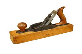 A Stanley Bailey No.5 1/4 jack plane, together with a 27 1/2 beech wood sole jack plane (2)