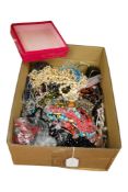 A large collection of costume jewels, comprising hardstone and simulant stone bead necklaces and
