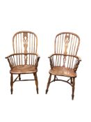 A near pair of 19th century Windsor ash and elm armchairs, width 55cm, depth 47cm, height 102cm