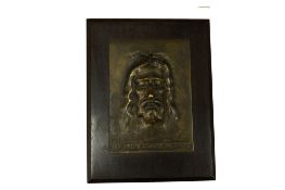 After Coutin, a cast bronze and ebony mask of Christ, ‘Le Saint Suaire de Turin’ height 21cm.