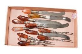 Six pairs of George III agate handled steel knives and forks. (12)
