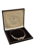 A stylish early 21st century silver, amethyst, chrysoprase and split pearl set necklace, by Ray