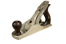 A scarce Stanley A4 aluminium smoothing plane, with the remains of a part trade label to the handle