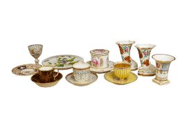 A group of 19th century Paris and Continental porcelain including a Sevres cup and saucer, a pair of