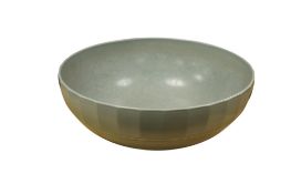Keith Murray for Wedgwood a circular matt blue glazed bowl, 24cm diameter.