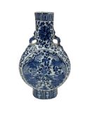 A Chinese blue and white moonflask decorated with dragons and flowers, 30cm high