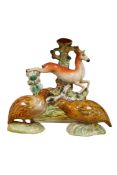 Two late 19th century Poulard-Béatrix faience figures of quail, together with a Staffordshire