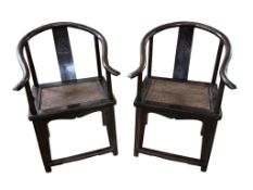 A pair of Chinese stained elm horseshoe back armchairs, Quanyi, Qing dynasty, width 64cm, depth